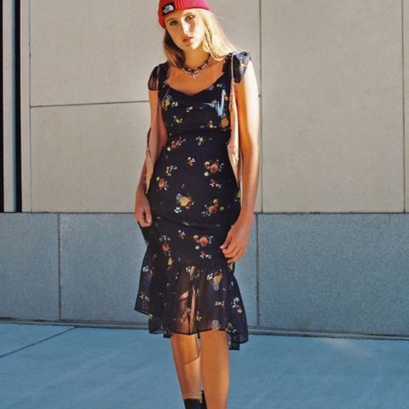 celeste ruffle front fitted midi dress